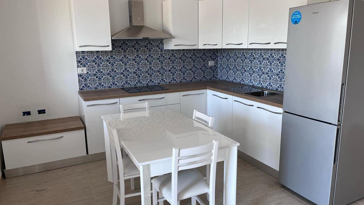Residence Le Maree Porto Pino Eksteriør billede
